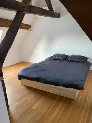 Un ou plusieurs lits dans un hébergement de l'établissement Appartement coeur de Beaune