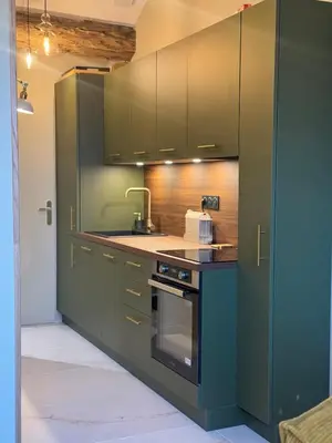 Cuisine ou kitchenette dans l'établissement Le Nid des Songes