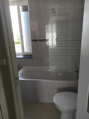 Salle de bains dans l'établissement Le Bellevue