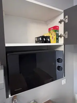 Cuisine ou kitchenette dans l'établissement Studio rénové - Centre Ville de semur