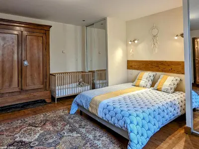Un ou plusieurs lits dans un hébergement de l'établissement Gîte confortable en bord de Saône - FR-1-583-461