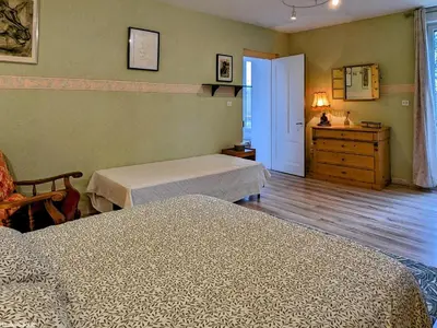 Un ou plusieurs lits dans un hébergement de l'établissement Gîte confortable en bord de Saône - FR-1-583-461