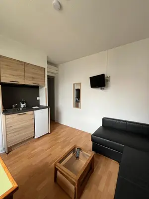 Cuisine ou kitchenette dans l'établissement Studio Manuia Climatisé au centre ville