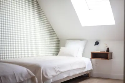 Un ou plusieurs lits dans un hébergement de l'établissement La Maison de Givry