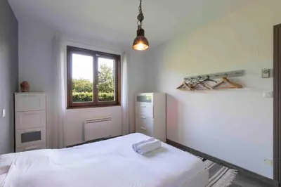 Un ou plusieurs lits dans un hébergement de l'établissement Cabana & Pavillon Bressan - Garden, Parking
