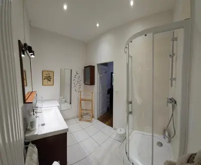 Salle de bains dans l'établissement Le Pasteur