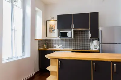 Cuisine ou kitchenette dans l'établissement Le Pasteur