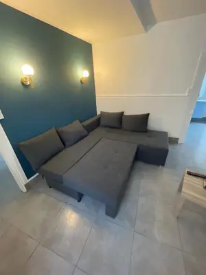 Coin salon dans l'établissement Petite maison avec cour