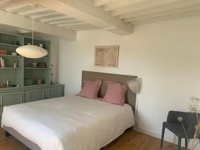 Un ou plusieurs lits dans un hébergement de l'établissement Charming house