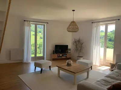 Télévision ou salle de divertissement dans l'établissement Charming house