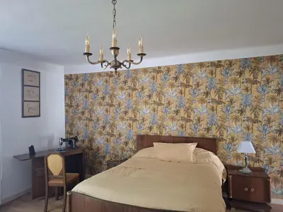 Un ou plusieurs lits dans un hébergement de l'établissement Maison de campagne avec jardin Chez nous
