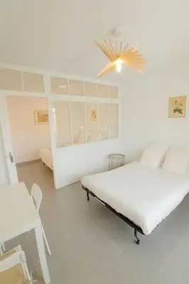Un ou plusieurs lits dans un hébergement de l'établissement L'Albatros - Appartement de charme à Digoin