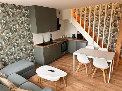 Cuisine ou kitchenette dans l'établissement Le nid du parc