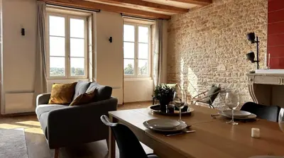 Coin salon dans l'établissement Le Prestige Mâconnais Calme Central Luxe