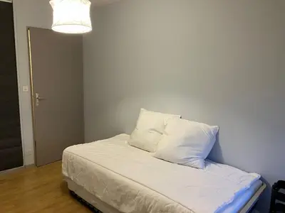 Un ou plusieurs lits dans un hébergement de l'établissement 4 bedroom family home