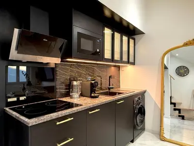 Cuisine ou kitchenette dans l'établissement Le Loft Contemporain - Climatisé & Smart TV au coeur de Dijon