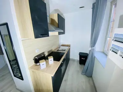 Cuisine ou kitchenette dans l'établissement T1 hypercenter, 50m Basilica