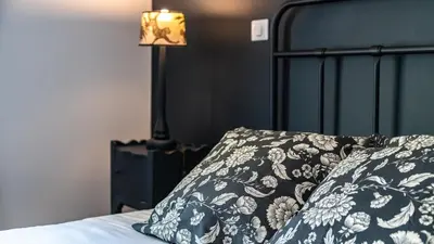 Un ou plusieurs lits dans un hébergement de l'établissement L'Ombelle