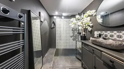 Salle de bains dans l'établissement L'Ombelle