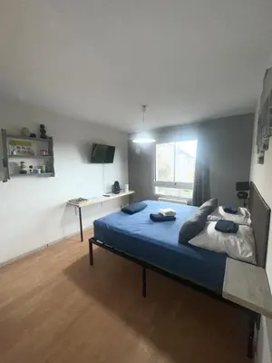 Un ou plusieurs lits dans un hébergement de l'établissement Studio centre ville Les logis de Paray 321