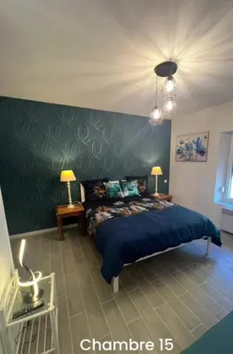 Un ou plusieurs lits dans un hébergement de l'établissement Gite la Vieille Auberge de Chaumard