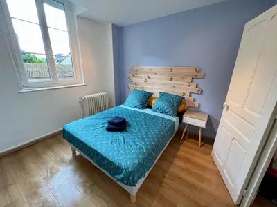 Un ou plusieurs lits dans un hébergement de l'établissement PERLE RARE centre-ville