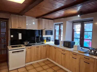 Cuisine ou kitchenette dans l'établissement Auberge du tilleul chambres de campagne dans la région lacs et cascades