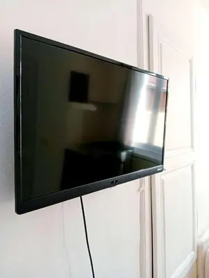 Télévision ou salle de divertissement dans l'établissement Topaze - En plein coeur de la ville Dijon