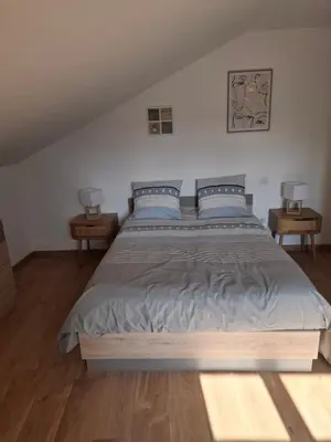 Un ou plusieurs lits dans un hébergement de l'établissement la maison bleue