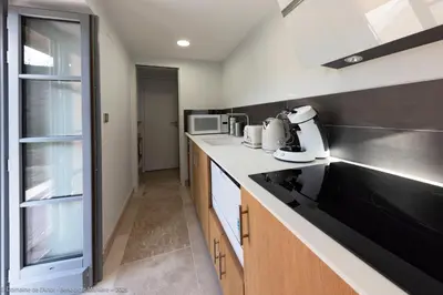 Cuisine ou kitchenette dans l'établissement La Maison de l'Arlot