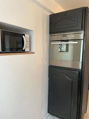 Cuisine ou kitchenette dans l'établissement Maison au cœur du vignoble