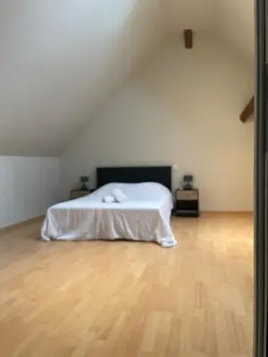 Un ou plusieurs lits dans un hébergement de l'établissement Maison au cœur du vignoble