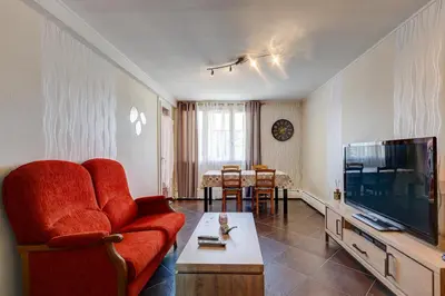 Télévision ou salle de divertissement dans l'établissement La Lune - Appt avec balcon