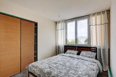 Un ou plusieurs lits dans un hébergement de l'établissement La Lune - Appt avec balcon