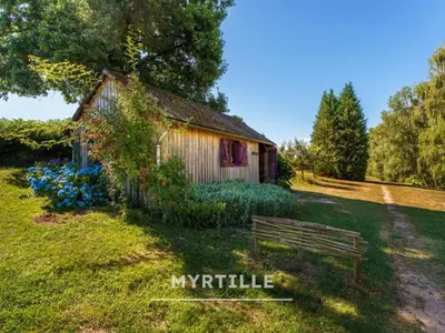 Jardin de l'établissement Gîte des fleurs - 5 Chalets