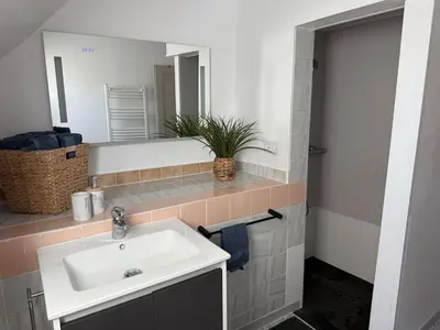 Salle de bains dans l'établissement Le Nid Dolois