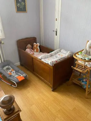 Un ou plusieurs lits dans un hébergement de l'établissement Vintage house Chez la Marcelle