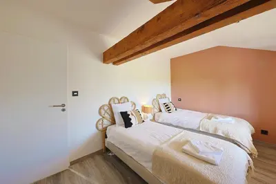 Un ou plusieurs lits dans un hébergement de l'établissement La ferme de Manon