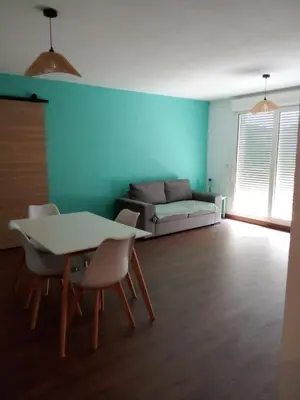 Coin salon dans l'établissement Appartement Mios