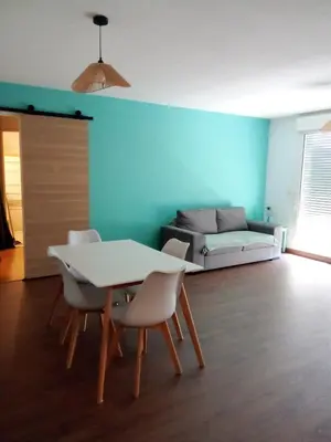 Coin salon dans l'établissement Appartement Mios
