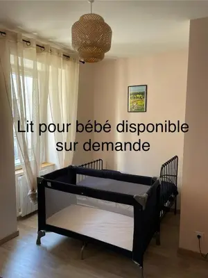 Un ou plusieurs lits dans un hébergement de l'établissement Au Cœur d Orgelet