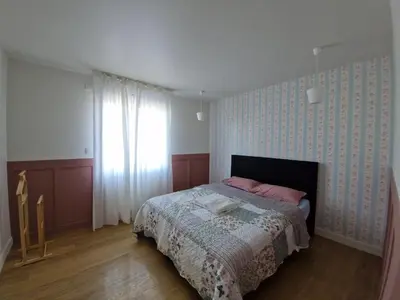 Un ou plusieurs lits dans un hébergement de l'établissement maison à la campagne