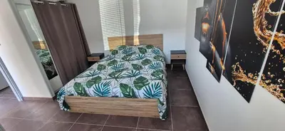 Un ou plusieurs lits dans un hébergement de l'établissement Maison plein coeur de village