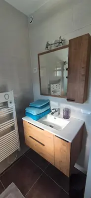 Un ou plusieurs lits dans un hébergement de l'établissement Maison plein coeur de village
