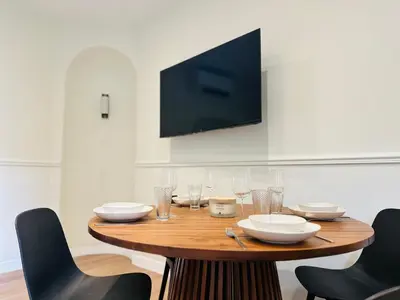 Télévision ou salle de divertissement dans l'établissement Élégant Philibert