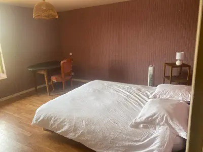 Un ou plusieurs lits dans un hébergement de l'établissement Maison cœur de village la petite montagne