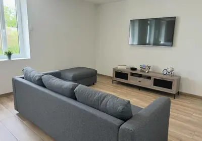 Coin salon dans l'établissement Maison rénovée - Climatisée - Paray-le-Monial - Au bois clair