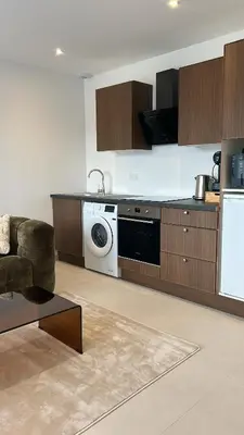 Cuisine ou kitchenette dans l'établissement Bien calme et spacieux avec baignoire balneo