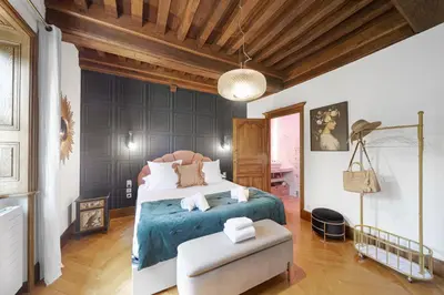 Un ou plusieurs lits dans un hébergement de l'établissement Villa Corpeau Montrachet