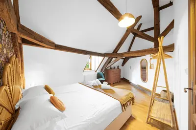 Un ou plusieurs lits dans un hébergement de l'établissement Villa Corpeau Montrachet